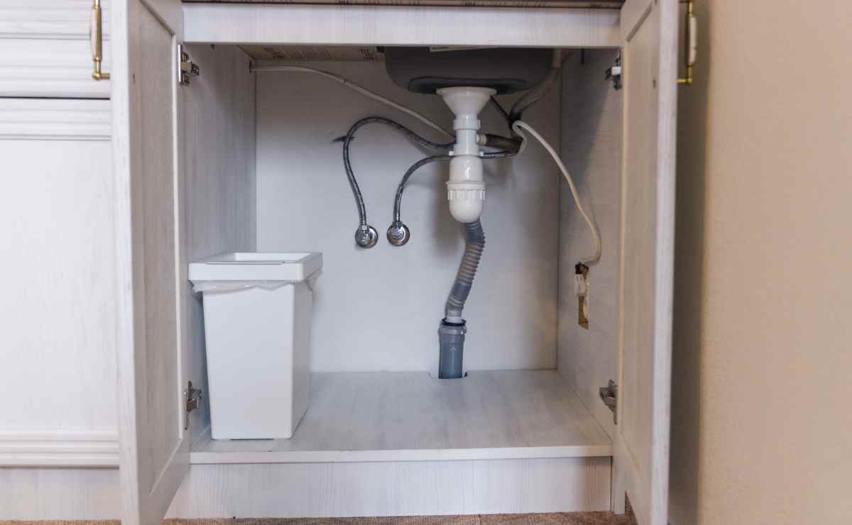 Corner under sink cabinet